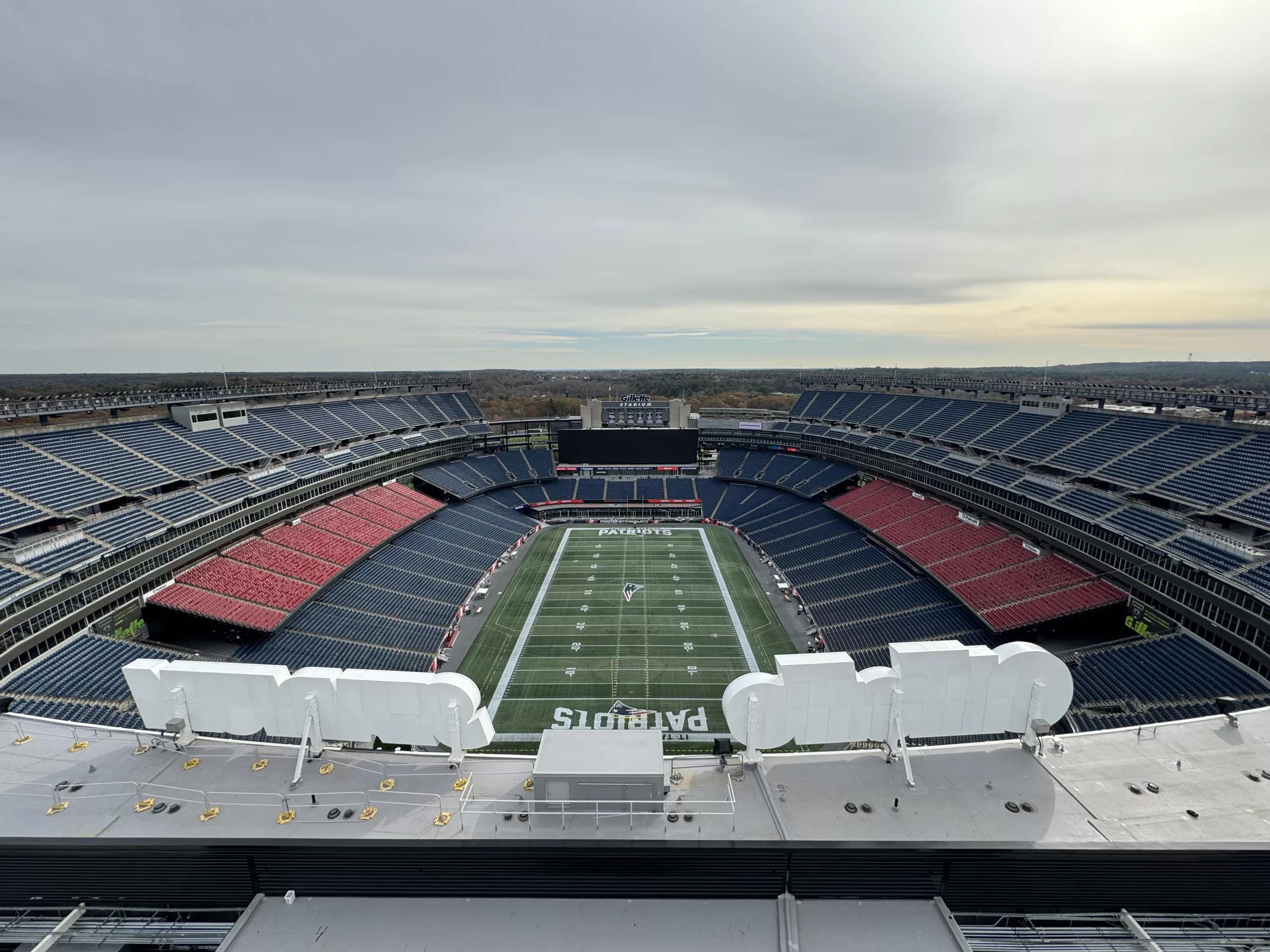 An empty Gillette Stadium in Foxborough, Massachusetts as seen from the top of the observation deck on top of the 218 foot high Lighthouse monument behind the north end zone.